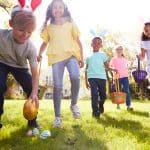Group,Of,Children,Wearing,Bunny,Ears,Running,To,Pick,Up